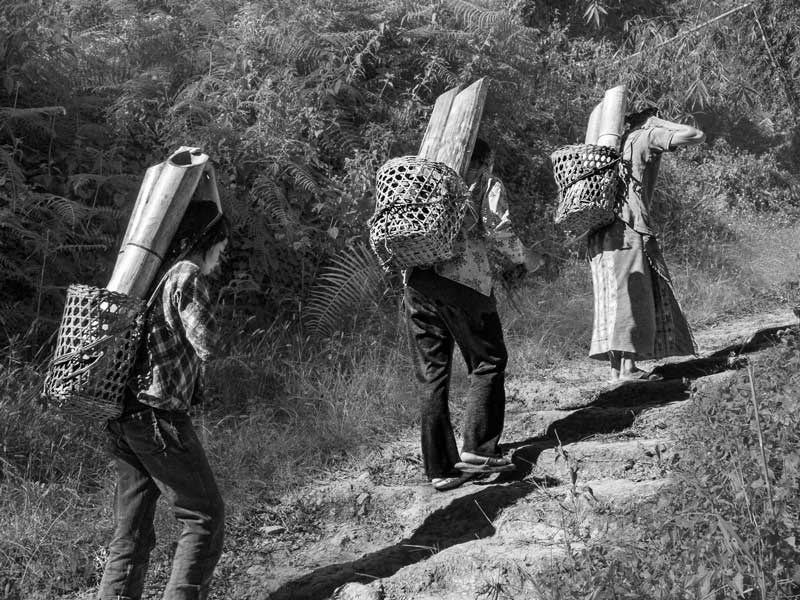 Human Right to Water in Nagaland - Women hauling water up a steep slope in Tuensang district